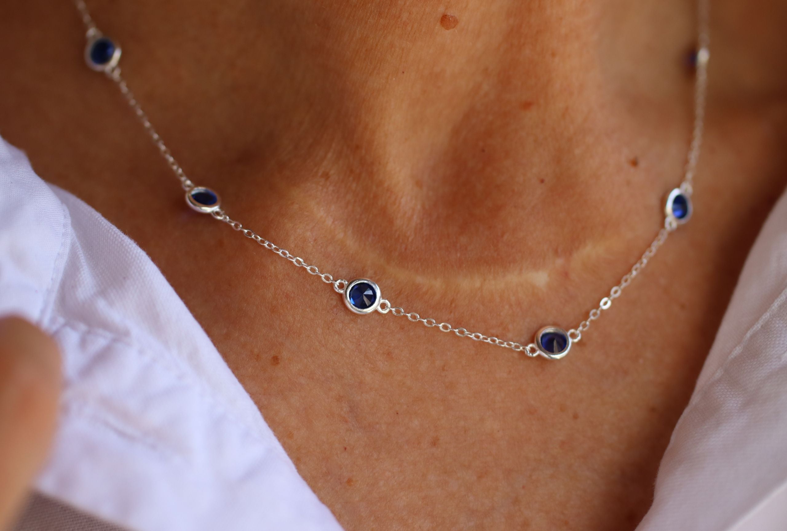 Feine Forzatina-Kette mit blauen Zirkonia-Steinen