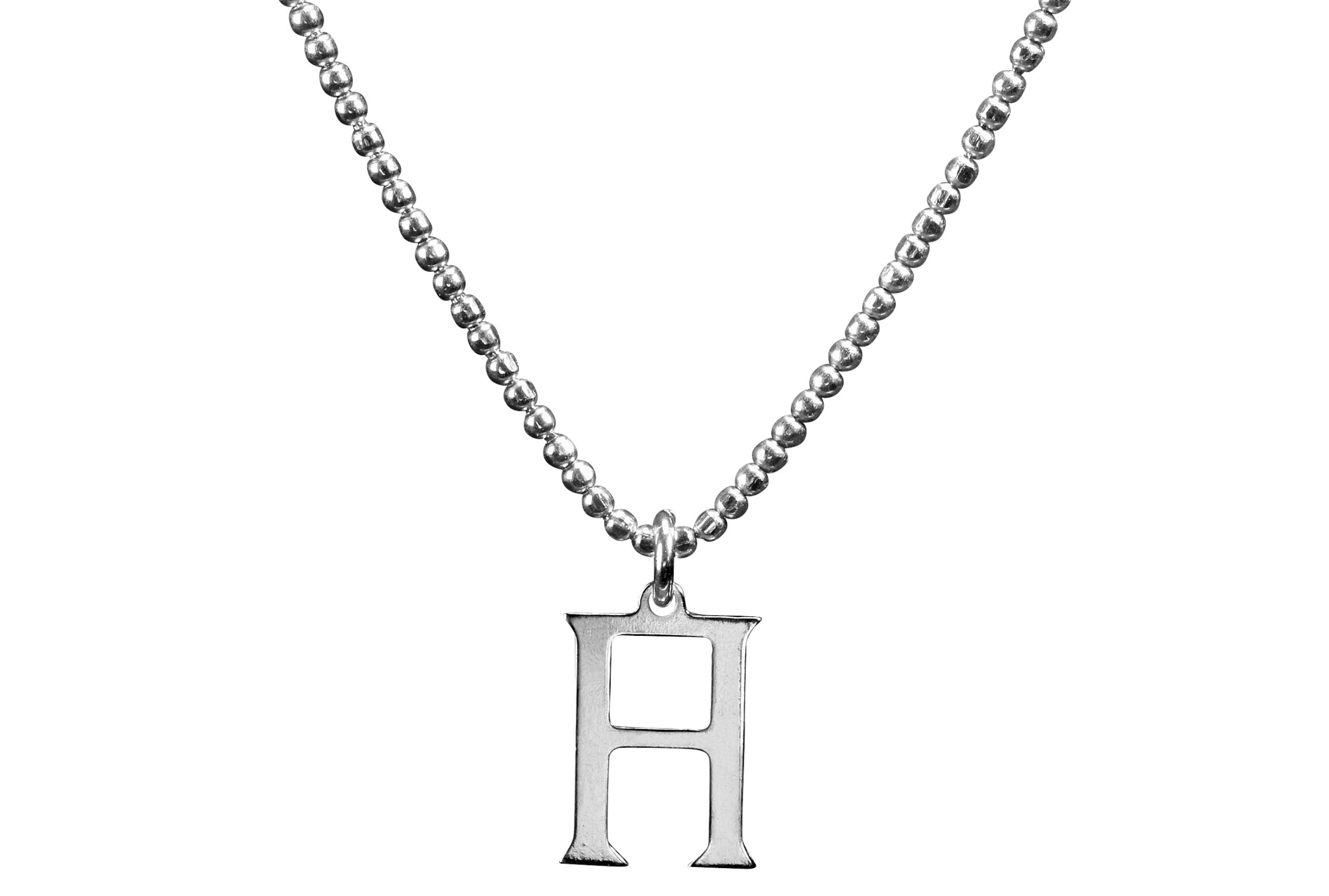 Diamantierte Kugelkette mit Sternzeichen Anhänger Zwillinge aus Silber.