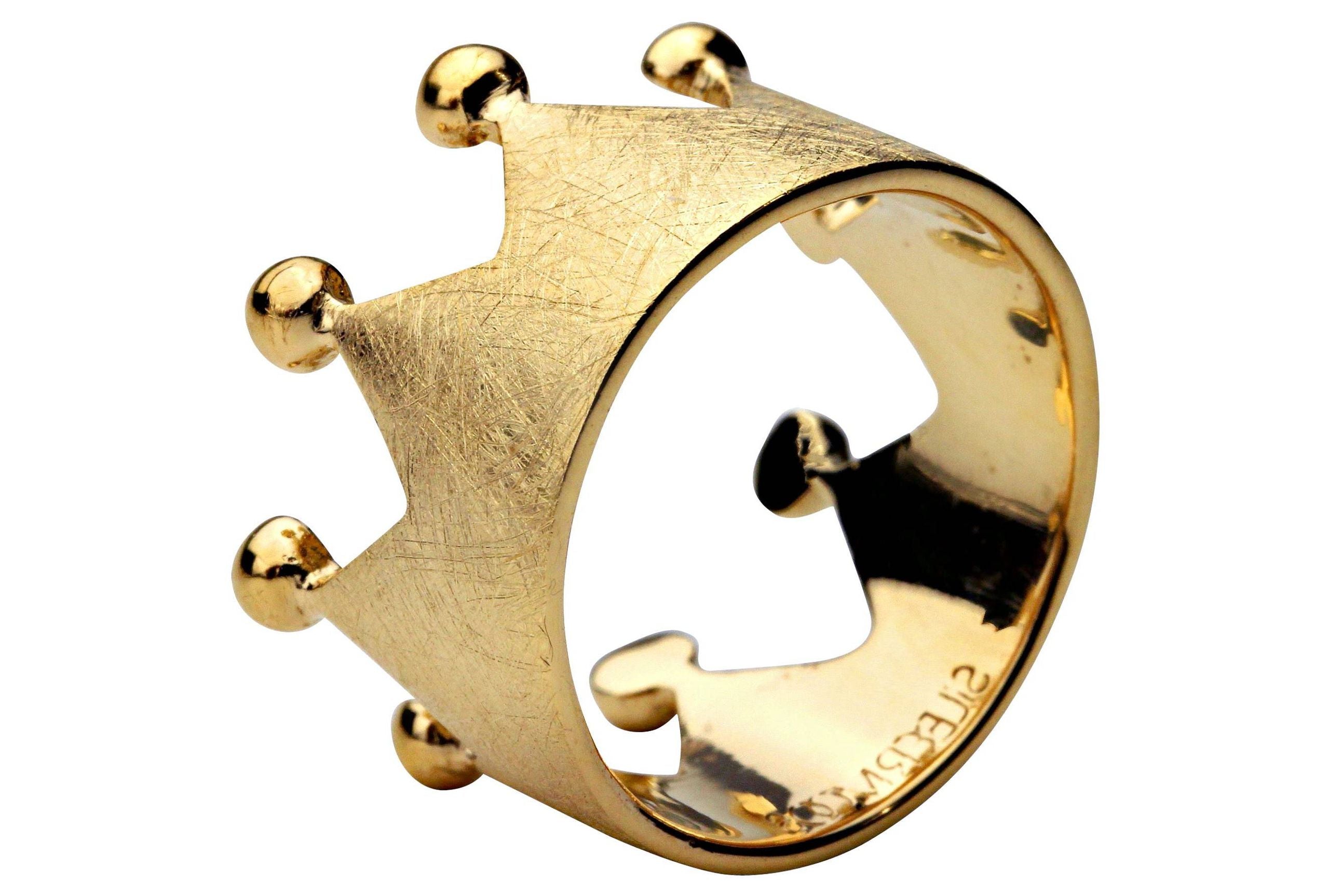 Ein Kronenring mit acht Zacken und acht Kügelchen an der Spitze, gefertigt aus Silber und mit Gold plattiert.