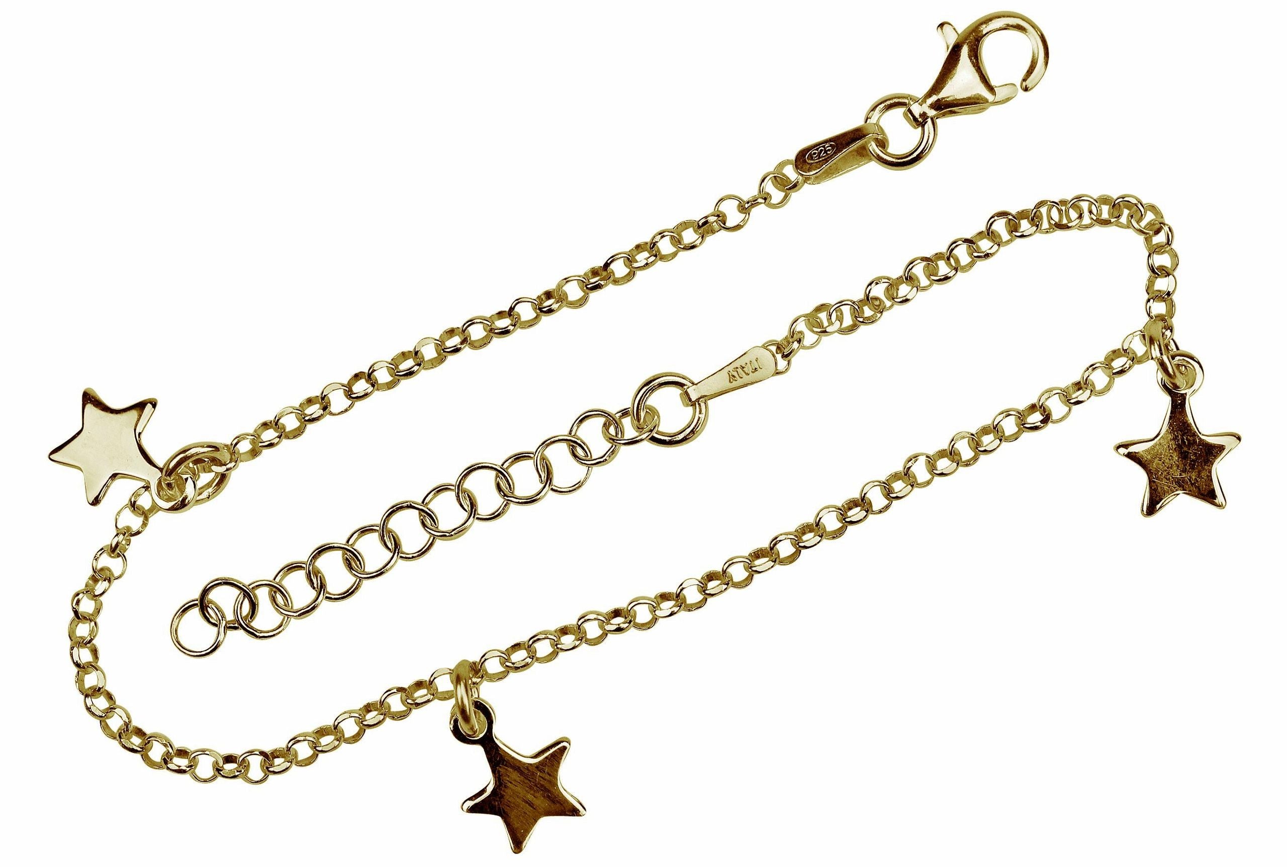 Ein Amband aus gold-plattiertem Silber aus einer feinen Kette und drei Sternen als Armband.