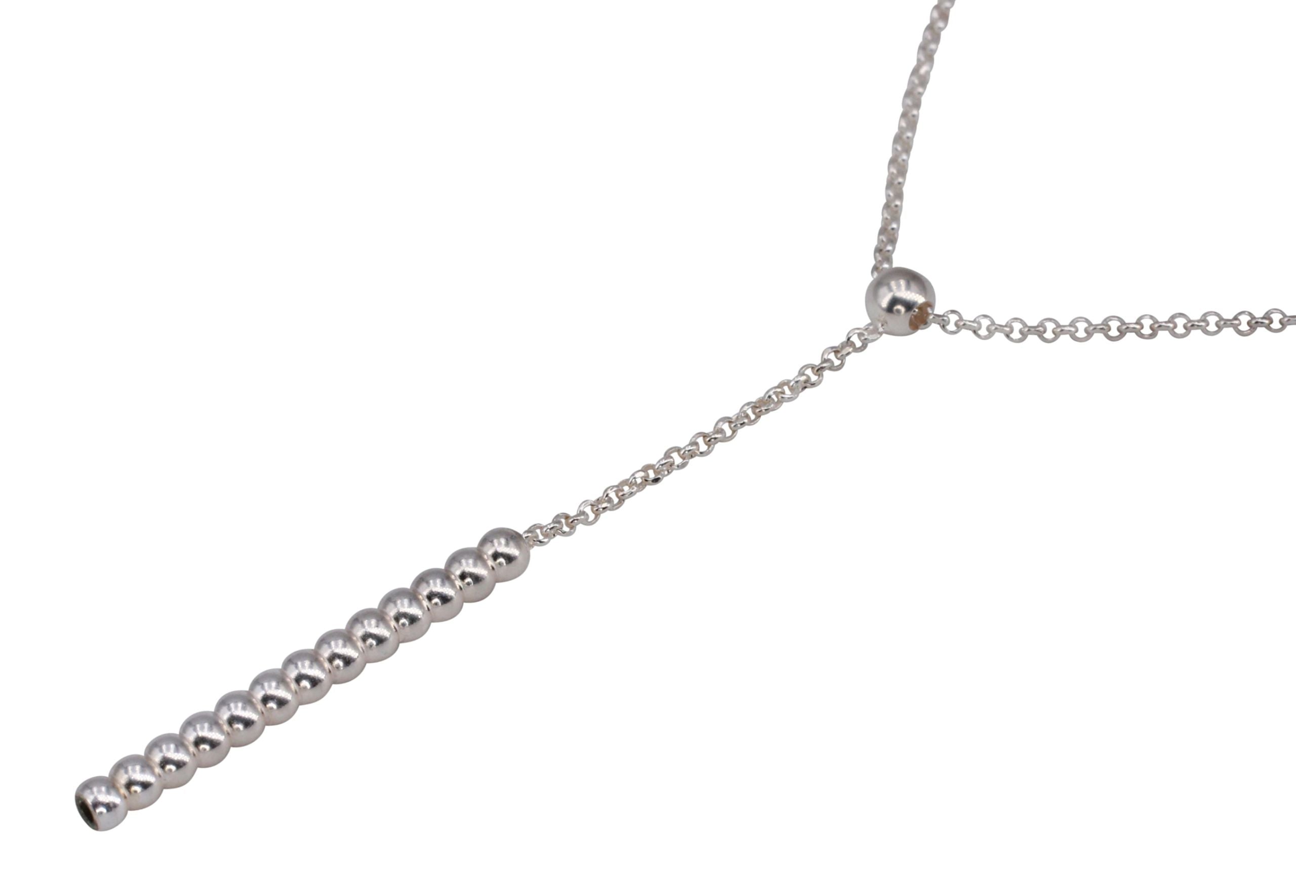 Eine Y-Rolokette aus Silber für Damen, die frei längenverstellbar zwischen 40 und 45 cm ist.