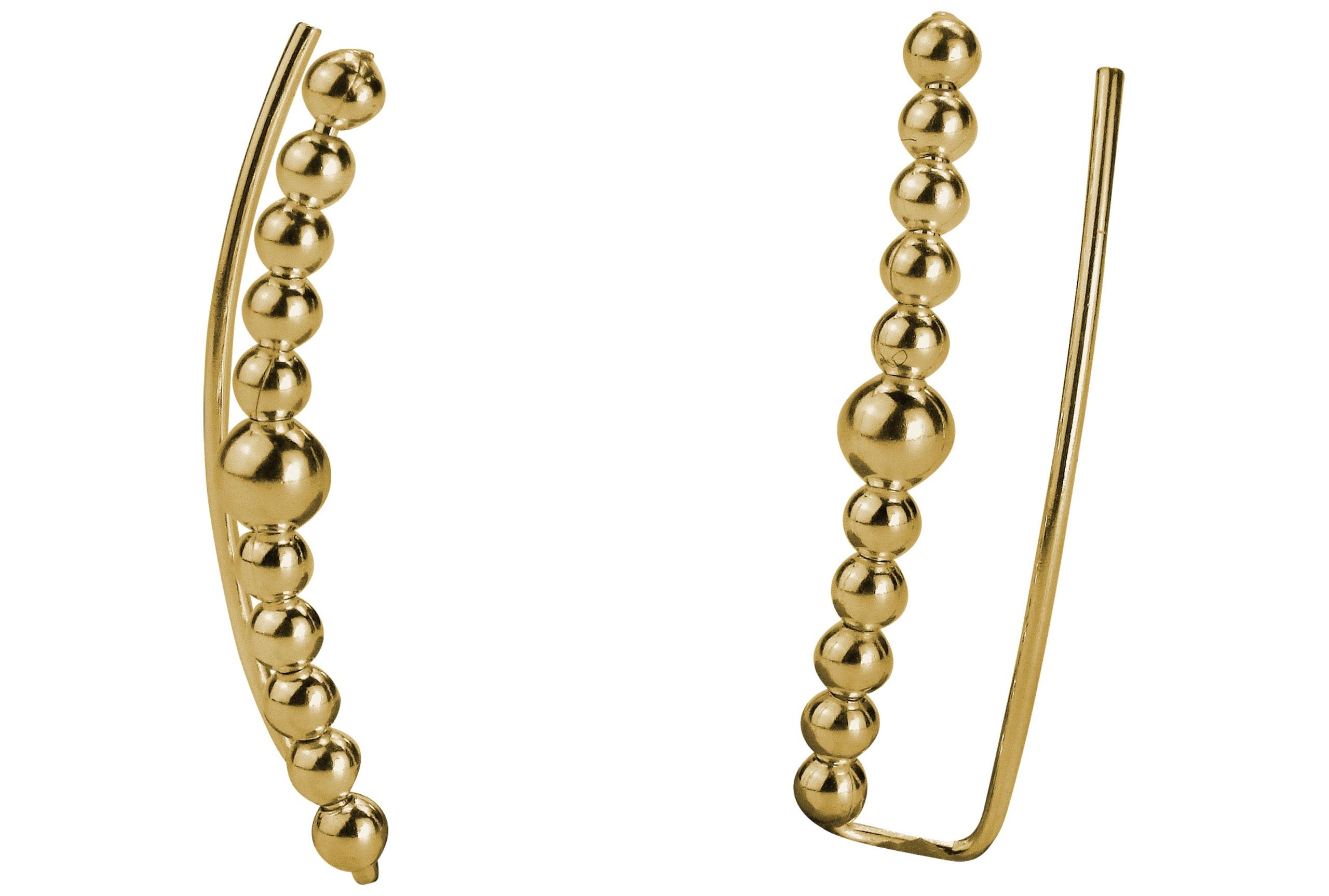 Ein Paar Earcuffs in Form aneinandergereihter kleiner Kugeln aus vergoldetem Silber für Damen.