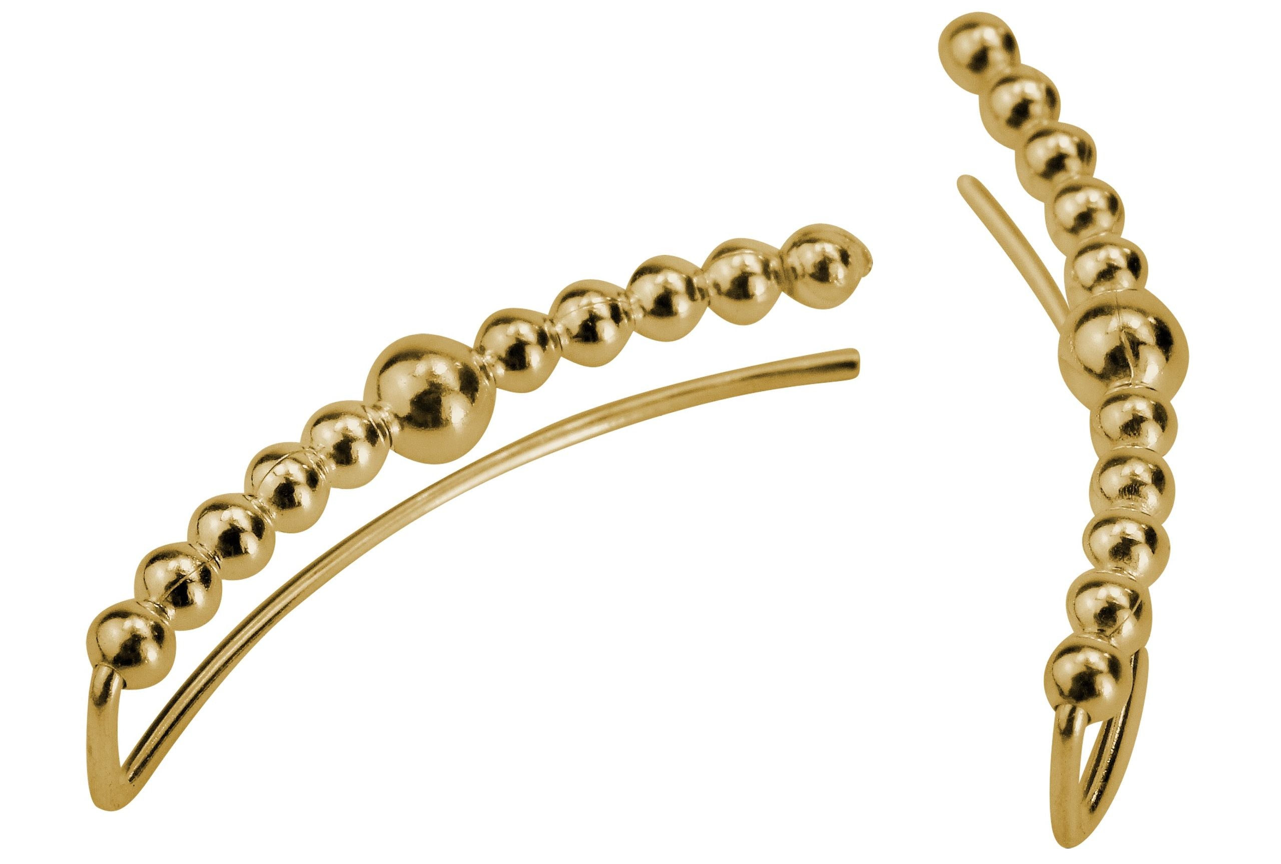 Ein Paar Earcuffs in Form aneinandergereihter kleiner Kugeln aus vergoldetem Silber für Damen.